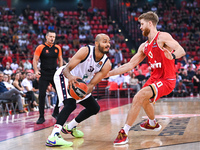 Shavon Shields of EA7 Emporio Armani Milan competes with Thomas Walkup of Olympiacos Piraeus during the Euroleague, Round 3 match between Ol...