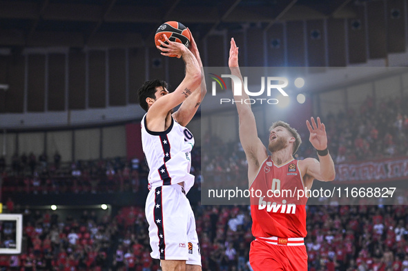 Leandro Bolmaro of EA7 Emporio Armani Milan competes with Thomas Walkup of Olympiacos Piraeus during the Euroleague, Round 3 match between O...