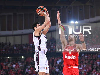 Leandro Bolmaro of EA7 Emporio Armani Milan competes with Thomas Walkup of Olympiacos Piraeus during the Euroleague, Round 3 match between O...