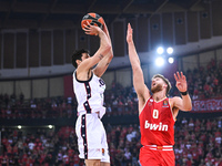 Leandro Bolmaro of EA7 Emporio Armani Milan competes with Thomas Walkup of Olympiacos Piraeus during the Euroleague, Round 3 match between O...