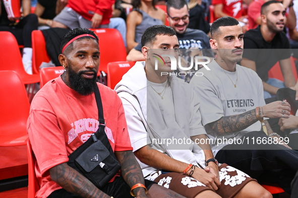 Rodinei, Santiago Hezze, and Chiquinho of the Olympiacos Piraeus football team participate in the Euroleague, Round 3 match between Olympiac...