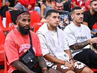 Rodinei, Santiago Hezze, and Chiquinho of the Olympiacos Piraeus football team participate in the Euroleague, Round 3 match between Olympiac...