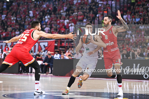 Neno Dimitrijevic of EA7 Emporio Armani Milan competes with Luca Vildoza of Olympiacos Piraeus during the Euroleague, Round 3 match between...