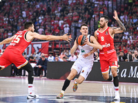 Neno Dimitrijevic of EA7 Emporio Armani Milan competes with Luca Vildoza of Olympiacos Piraeus during the Euroleague, Round 3 match between...