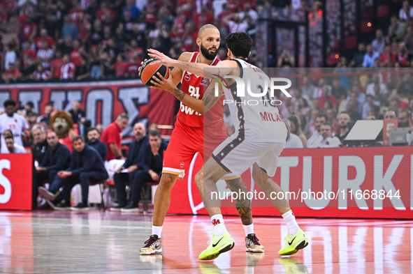 Evan Fournier of Olympiacos Piraeus competes with Leandro Bolmaro of EA7 Emporio Armani Milan during the Euroleague, Round 3 match between O...