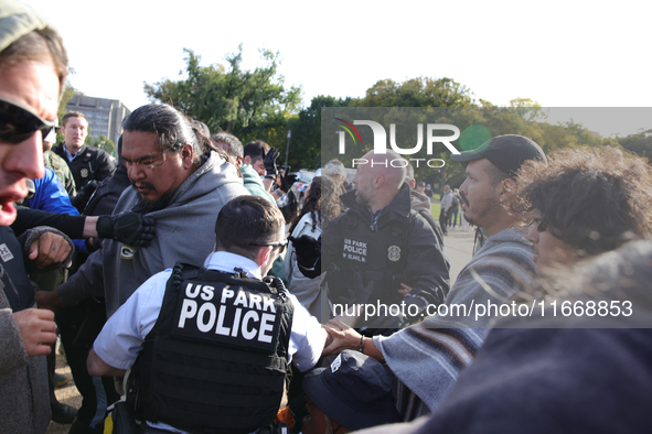 Indigenous demonstrators clash with police near the U.S. Capitol in Washington, D.C. on October 15, 2024 after U.S. Park Police attempt to c...