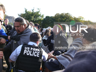 Indigenous demonstrators clash with police near the U.S. Capitol in Washington, D.C. on October 15, 2024 after U.S. Park Police attempt to c...