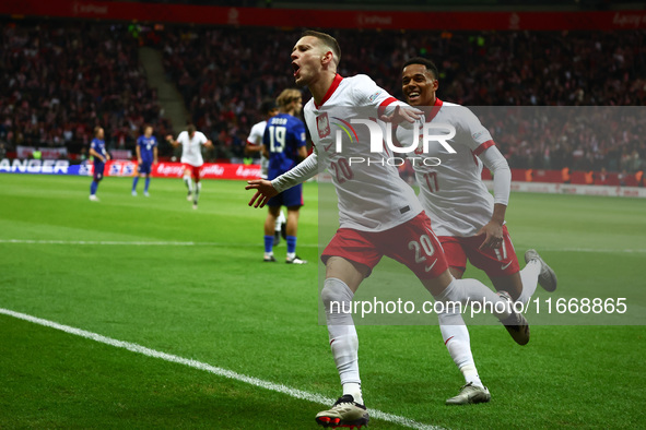 Sebastian Szymanski and Michael Ameyew of Poland celebrate the goal during UEFA Nations League football match Poland - Croatia at National S...