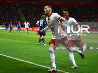 Sebastian Szymanski and Michael Ameyew of Poland celebrate the goal during UEFA Nations League football match Poland - Croatia at National S...