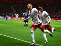 Sebastian Szymanski and Michael Ameyew of Poland celebrate the goal during UEFA Nations League football match Poland - Croatia at National S...