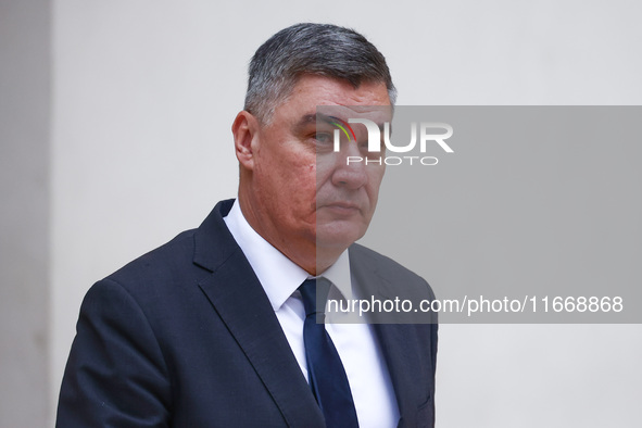 Croatia's President Zoran Milanovic attends a welcome ceremony during the Arraiolos Group meeting at the Wawel Royal Castle in Krakow, Polan...