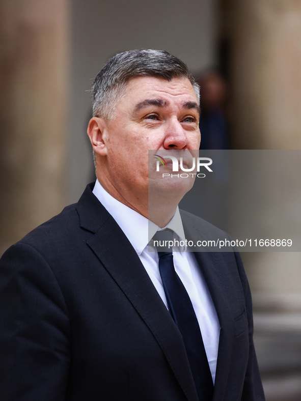 Croatia's President Zoran Milanovic attends a welcome ceremony during the Arraiolos Group meeting at the Wawel Royal Castle in Krakow, Polan...