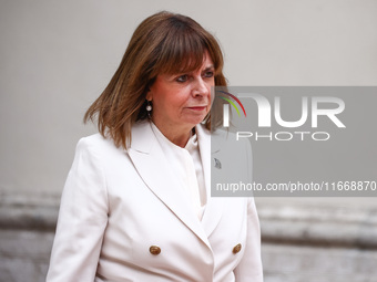 Greece's President Katerina Sakellaropoulou attends a welcome ceremony during the Arraiolos Group meeting at the Wawel Royal Castle in Krako...