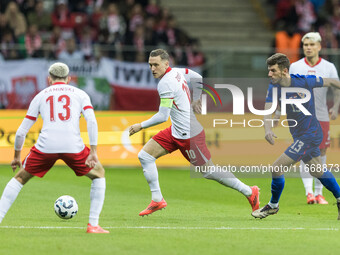 Jakub Kaminski , Piotr Zielinski , Petar Sucic  during UEFA Nations League match Poland vs Croatia in Warsaw Poland on 15 October 2024. (