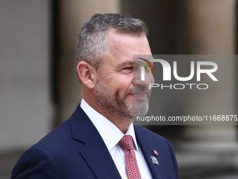 Slovakia's President Peter Pellegrini attends a welcome ceremony during the Arraiolos Group meeting at the Wawel Royal Castle in Krakow, Pol...