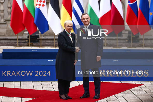 President of Poland Andrzej Duda and Slovenia's President Natasa Pirc Musar attend a welcome ceremony during the Arraiolos Group meeting at...