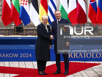 President of Poland Andrzej Duda and Slovenia's President Natasa Pirc Musar attend a welcome ceremony during the Arraiolos Group meeting at...