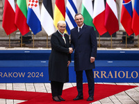 President of Poland Andrzej Duda and Slovenia's President Natasa Pirc Musar attend a welcome ceremony during the Arraiolos Group meeting at...