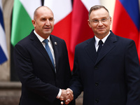 President of Poland Andrzej Duda and Bulgaria's President Rumen Radev attend a welcome ceremony during the Arraiolos Group meeting at the Wa...