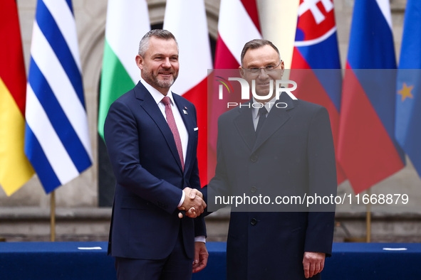 President of Poland Andrzej Duda and Slovakia's President Peter Pellegrini attend a welcome ceremony during the Arraiolos Group meeting at t...