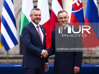 President of Poland Andrzej Duda and Slovakia's President Peter Pellegrini attend a welcome ceremony during the Arraiolos Group meeting at t...