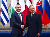 President of Poland Andrzej Duda and Slovakia's President Peter Pellegrini attend a welcome ceremony during the Arraiolos Group meeting at t...