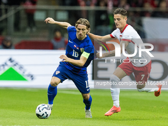 Luka Modric , Kacper Urbanski  during UEFA Nations League match Poland vs Croatia in Warsaw Poland on 15 October 2024. (