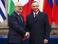 President of Poland Andrzej Duda and Estonia's President Alar Karis attend a welcome ceremony during the Arraiolos Group meeting at the Wawe...