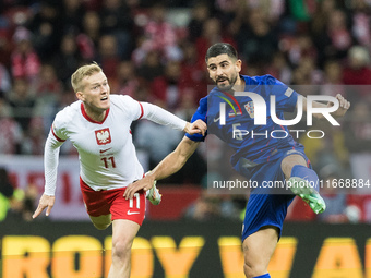 Karol Swiderski , Martin Erlic  during UEFA Nations League match Poland vs Croatia in Warsaw Poland on 15 October 2024. (