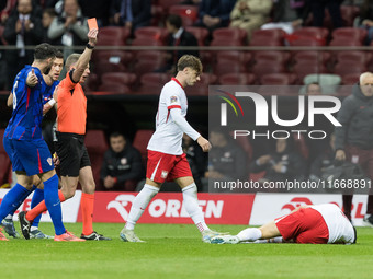 Referee Alejandro Hernandez, red card, Nicola Zalewski , Robert Lewandowski  during UEFA Nations League match Poland vs Croatia in Warsaw Po...