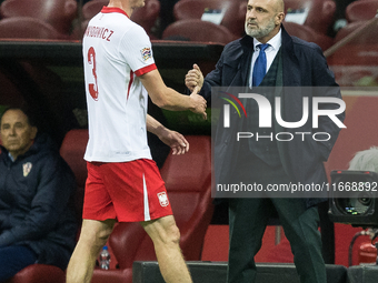 Pawel Dawidowicz , Coach Michal Probierz during UEFA Nations League match Poland vs Croatia in Warsaw Poland on 15 October 2024. (