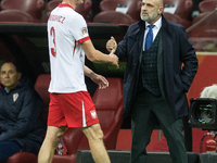 Pawel Dawidowicz , Coach Michal Probierz during UEFA Nations League match Poland vs Croatia in Warsaw Poland on 15 October 2024. (