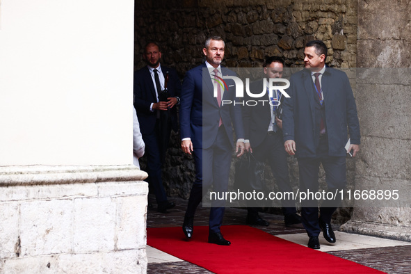 Slovakia's President Peter Pellegrini attends a welcome ceremony during the Arraiolos Group meeting at the Wawel Royal Castle in Krakow, Pol...