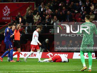 Robert Lewandowski of Poland and Dominik Livakovic of Croatia during UEFA Nations League football match Poland - Croatia at National Stadium...