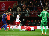 Robert Lewandowski of Poland and Dominik Livakovic of Croatia during UEFA Nations League football match Poland - Croatia at National Stadium...