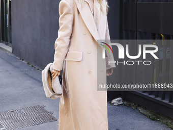 Frida Aasen attends the Max Mara Fashion Show during the Milan Womenswear Spring/Summer 2025 in Milan, Italy, on September 19, 2024 (