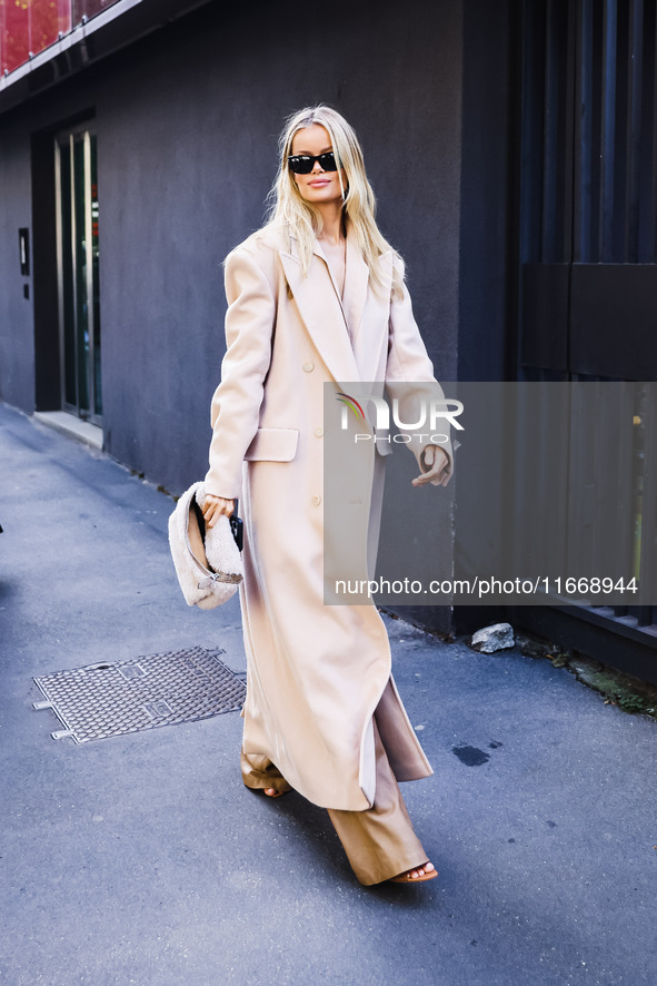 Frida Aasen attends the Max Mara Fashion Show during the Milan Womenswear Spring/Summer 2025 in Milan, Italy, on September 19, 2024 