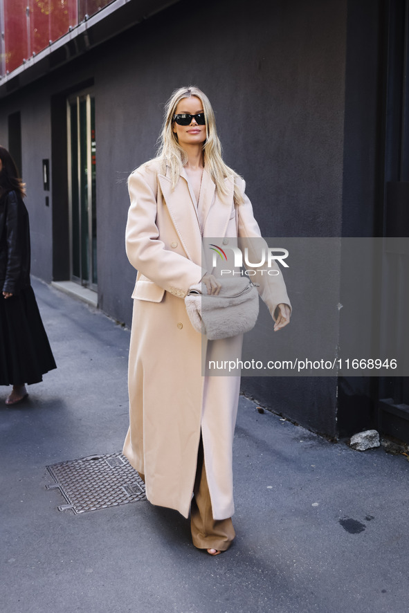 Frida Aasen attends the Max Mara Fashion Show during the Milan Womenswear Spring/Summer 2025 in Milan, Italy, on September 19, 2024 