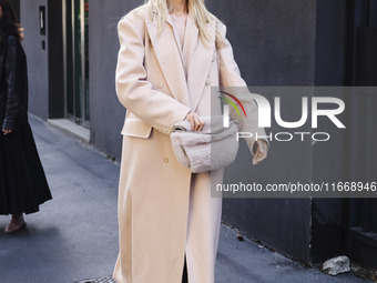 Frida Aasen attends the Max Mara Fashion Show during the Milan Womenswear Spring/Summer 2025 in Milan, Italy, on September 19, 2024 (