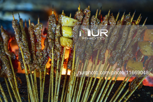 Lamb kebabs are seen at a stall at a night market in Guiyang, China, on August 25, 2024. 