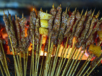 Lamb kebabs are seen at a stall at a night market in Guiyang, China, on August 25, 2024. (