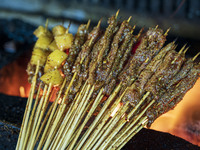 Lamb kebabs are seen at a stall at a night market in Guiyang, China, on August 25, 2024. (