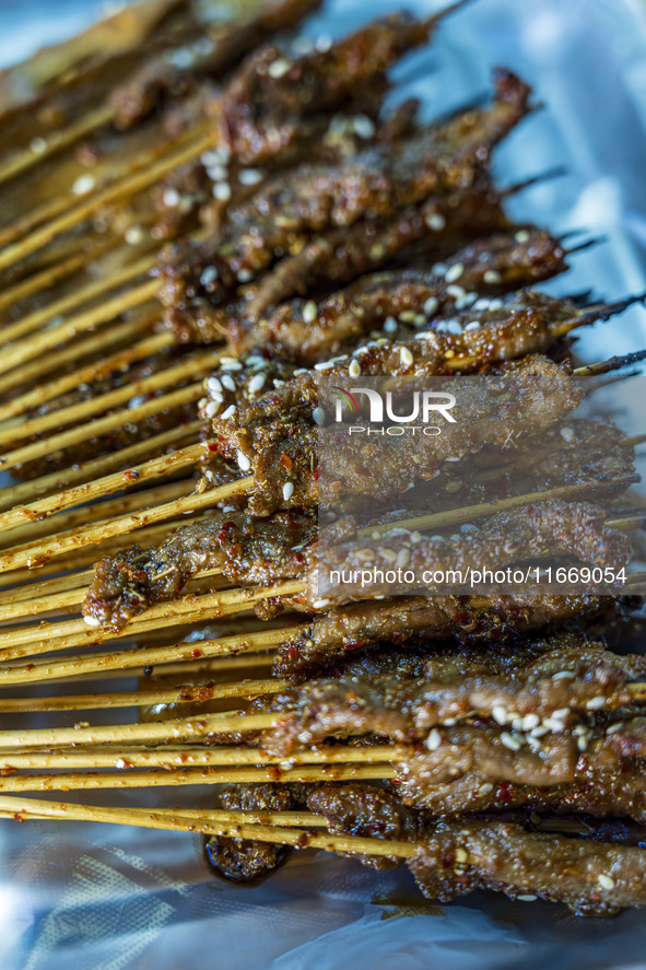 Lamb kebabs are seen at a stall at a night market in Guiyang, China, on August 25, 2024. 