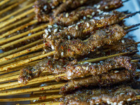 Lamb kebabs are seen at a stall at a night market in Guiyang, China, on August 25, 2024. (