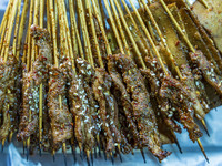 Lamb kebabs are seen at a stall at a night market in Guiyang, China, on August 25, 2024. (