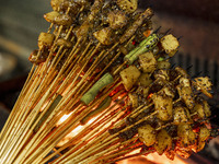 Lamb kebabs are seen at a stall at a night market in Guiyang, China, on August 25, 2024. (