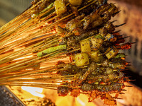 Lamb kebabs are seen at a stall at a night market in Guiyang, China, on August 25, 2024. (