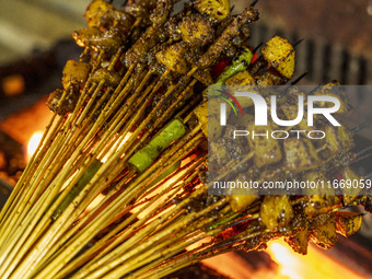 Lamb kebabs are seen at a stall at a night market in Guiyang, China, on August 25, 2024. (