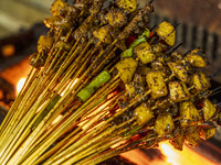 Lamb kebabs are seen at a stall at a night market in Guiyang, China, on August 25, 2024. (