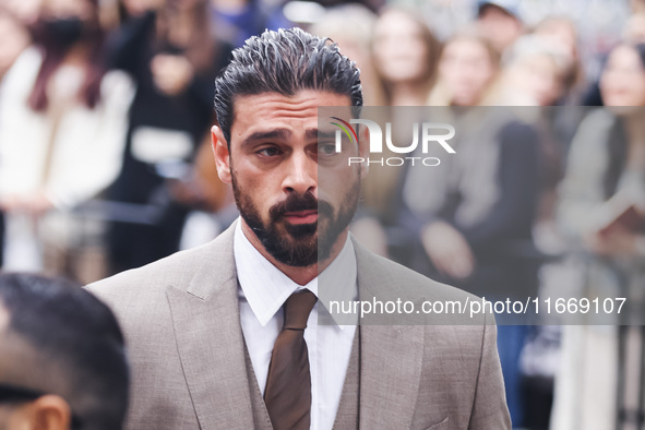 Michele Morrone attends the Boss Fashion Show during the Milan Womenswear Spring/Summer 2025 in Milan, Italy, on September 18, 2024 